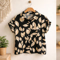 Black leaf print short sleeve button up shirt for women